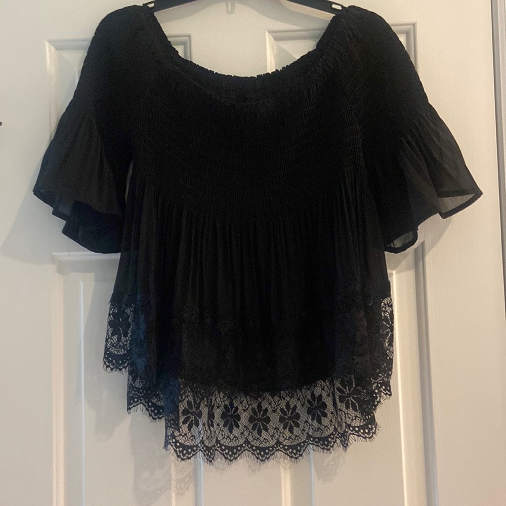 Beautiful boutique bought, black lace top